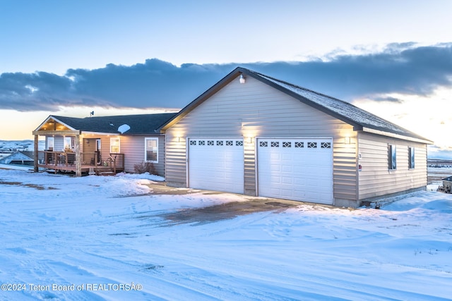 ranch-style house featuring a garage