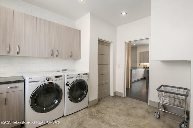 3139 Slinger Ct, Driggs, ID 83422 - laundry room with washing machine and dryer, cabinet space, baseboards, and recessed lighting