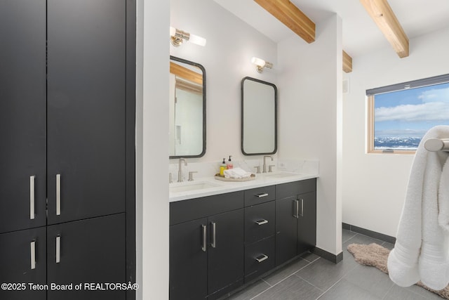 3139 Slinger Ct, Driggs, ID 83422 - full bath with beamed ceiling, double vanity, tile patterned flooring, and baseboards