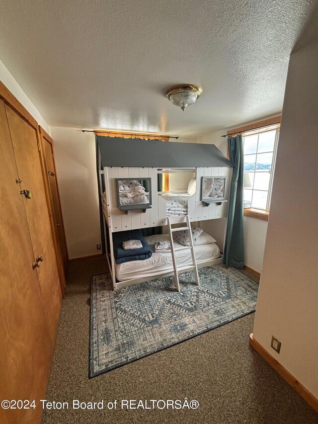 bedroom with a textured ceiling