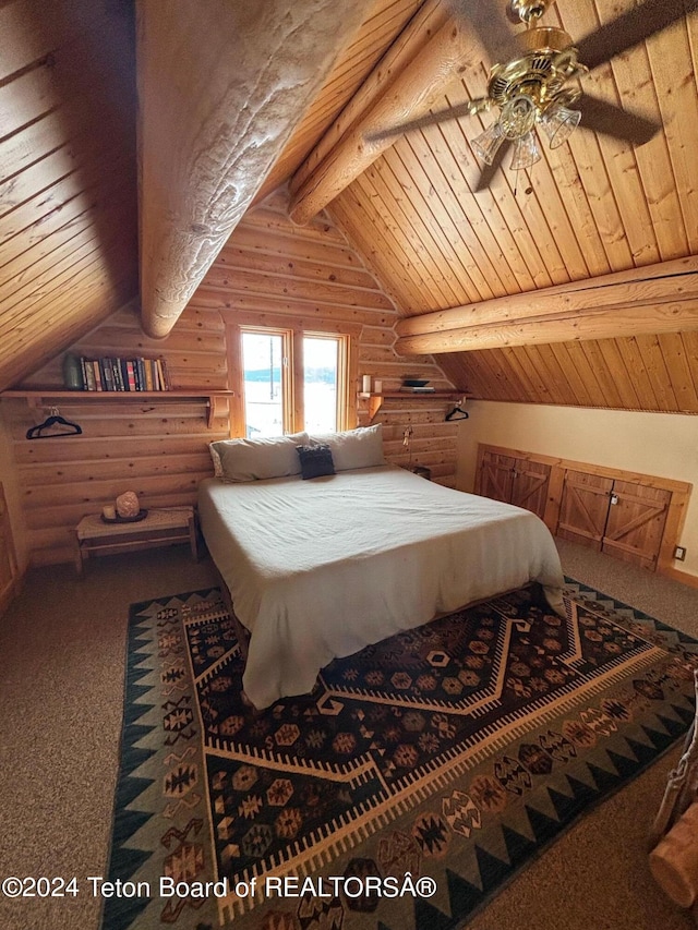 bedroom featuring lofted ceiling with beams, wooden ceiling, rustic walls, and dark colored carpet