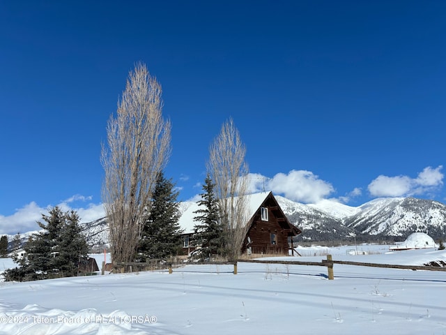 exterior space featuring a mountain view