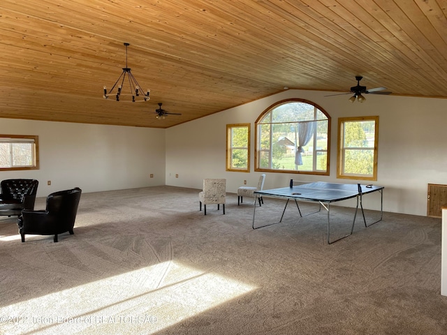 recreation room with wooden ceiling, light carpet, and ceiling fan with notable chandelier