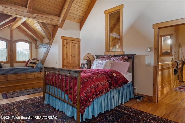 5 W Blair Rd, Alta, WY 83414 - bedroom featuring lofted ceiling with beams, wood ceiling, and dark wood-type flooring