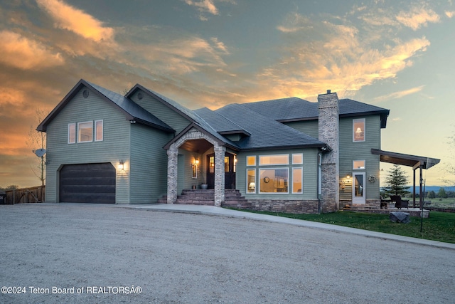 view of front of property with a garage