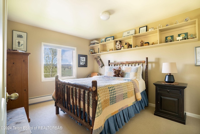 carpeted bedroom with baseboard heating