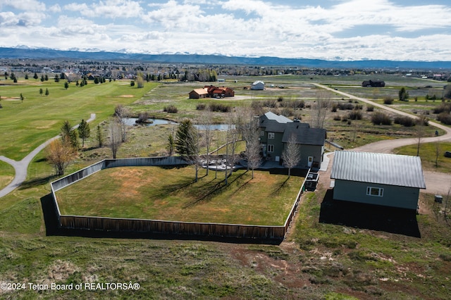 aerial view featuring a rural view and a mountain view