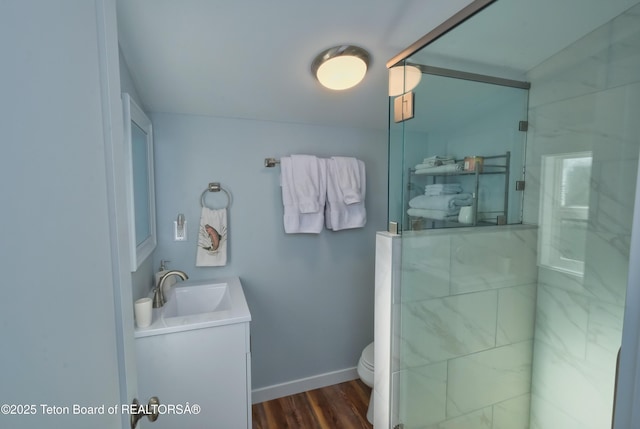 4193 Old Irwin Rd, Irwin, ID 83428 - full bath with vanity, a marble finish shower, and wood finished floors