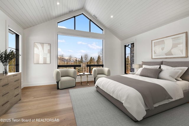 bedroom featuring baseboards, high vaulted ceiling, visible vents, and light wood-style floors