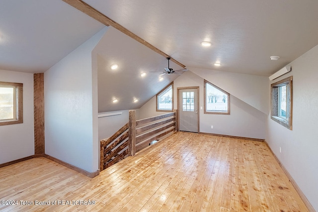 bonus room featuring lofted ceiling, ceiling fan, and light hardwood / wood-style floors