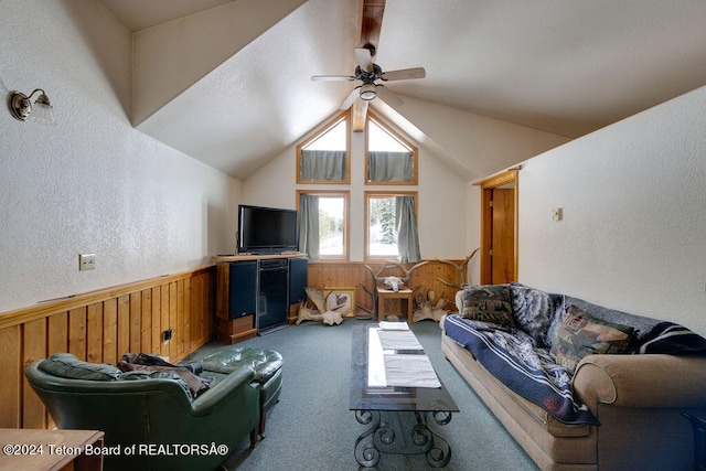 carpeted living room featuring ceiling fan and vaulted ceiling