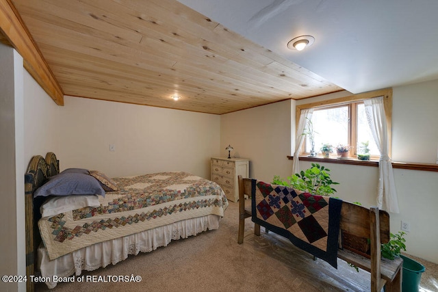 bedroom with carpet and wooden ceiling