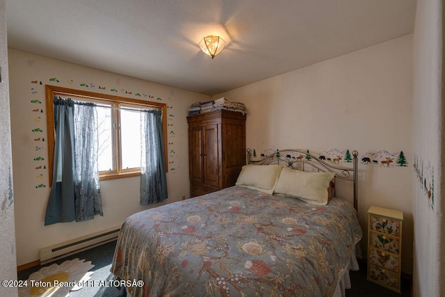 carpeted bedroom featuring a baseboard radiator