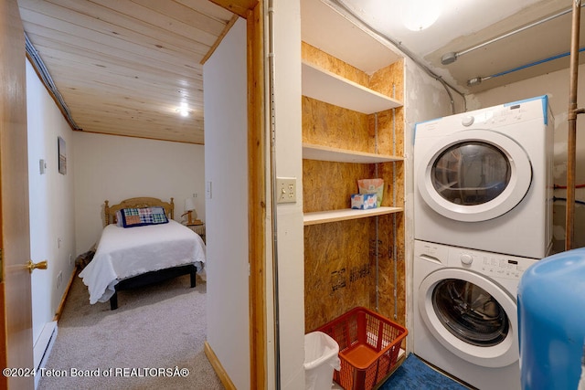 laundry area featuring carpet flooring and stacked washer and clothes dryer