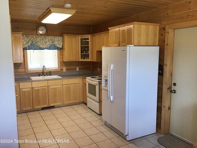 kitchen with light brown cabinetry, white appliances, wood ceiling, and sink