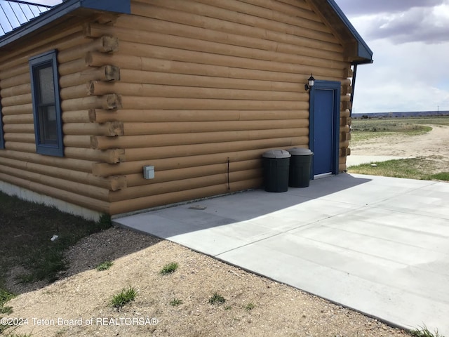 view of home's exterior with a patio area