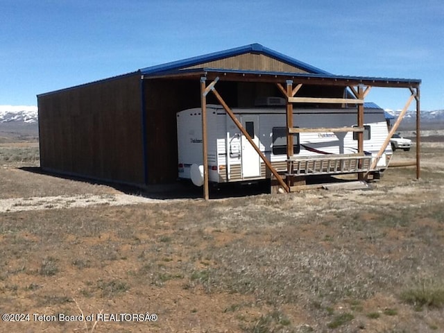 exterior space featuring a mountain view