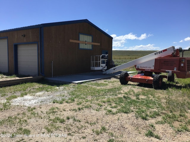 view of outbuilding with a garage