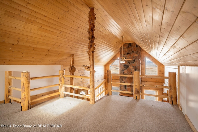 additional living space featuring ceiling fan, carpet floors, wooden ceiling, and lofted ceiling