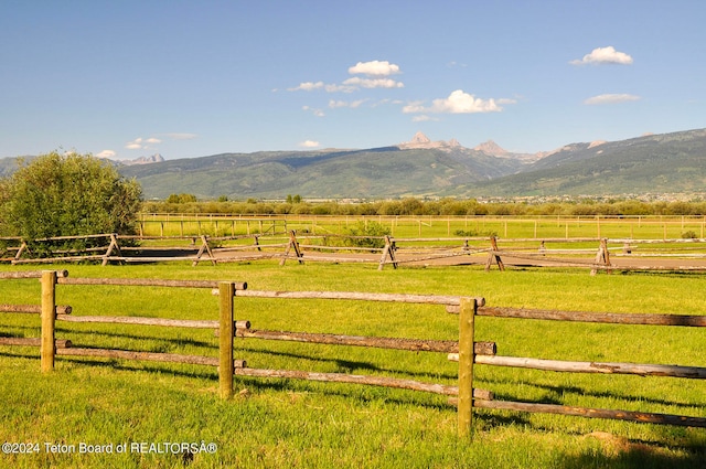 property view of mountains featuring a rural view