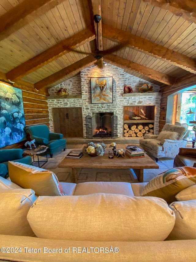 living room with wood ceiling, vaulted ceiling with beams, and a fireplace