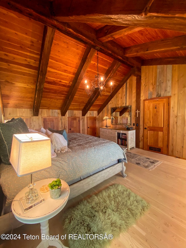 bedroom with wooden walls, lofted ceiling with beams, hardwood / wood-style floors, and wood ceiling