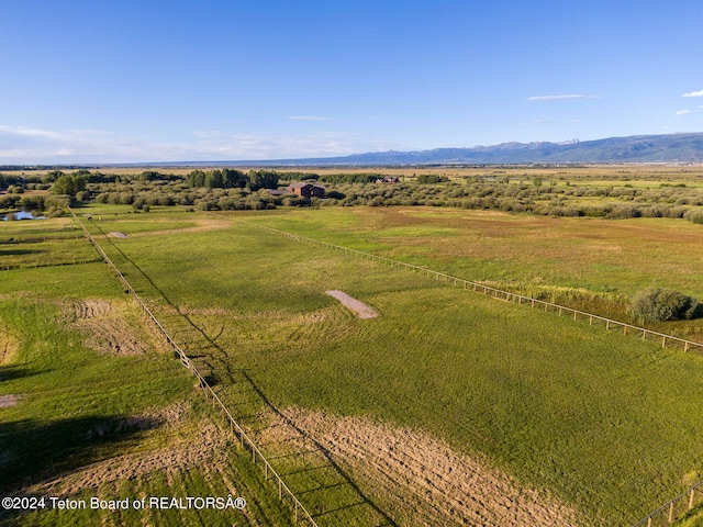 birds eye view of property featuring a rural view