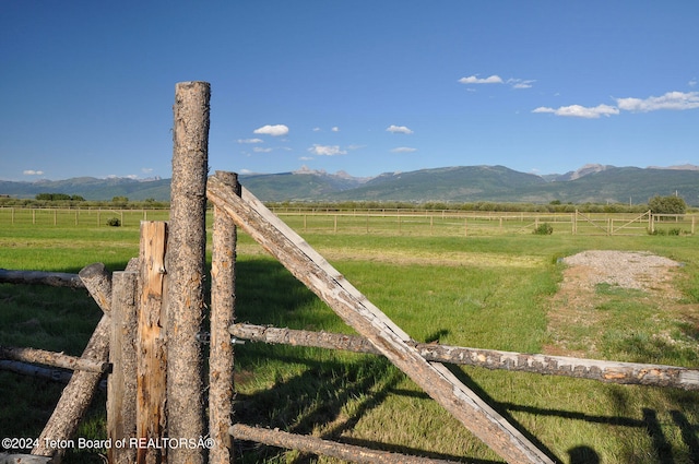 view of mountain feature featuring a rural view