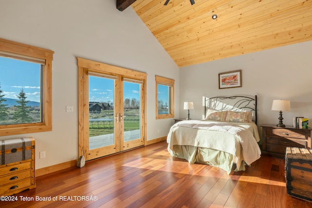 bedroom featuring access to outside, beam ceiling, hardwood / wood-style floors, and high vaulted ceiling