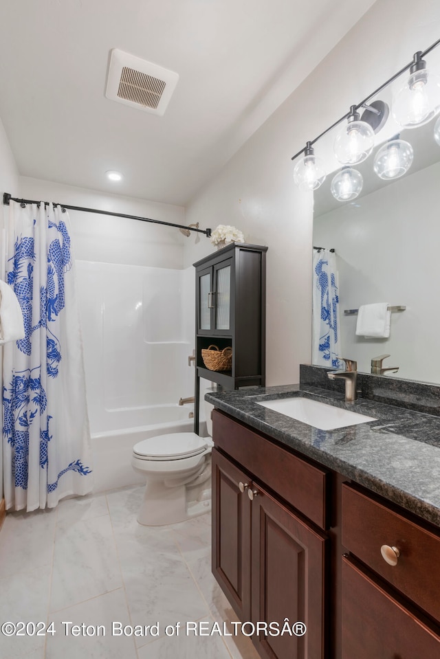 full bathroom featuring vanity, toilet, and shower / bath combination with curtain