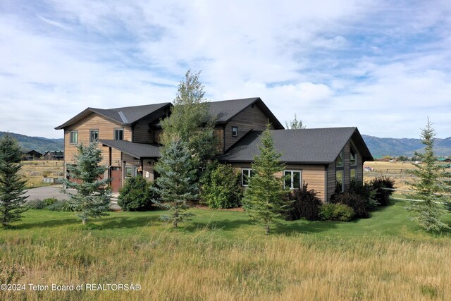 exterior space with a mountain view