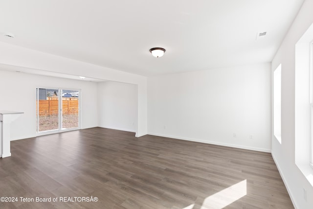 spare room featuring hardwood / wood-style flooring