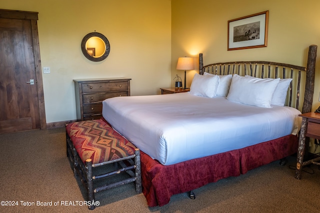 bedroom featuring carpet