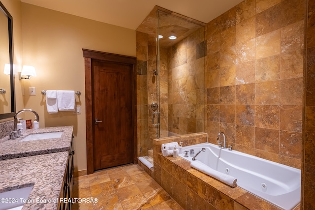 bathroom with vanity, tile patterned flooring, and separate shower and tub