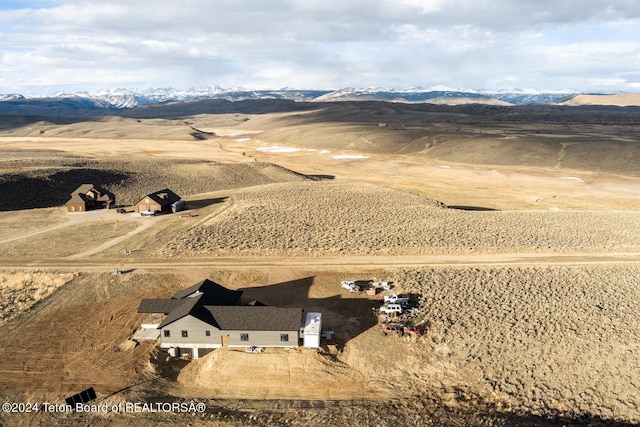 drone / aerial view featuring a mountain view