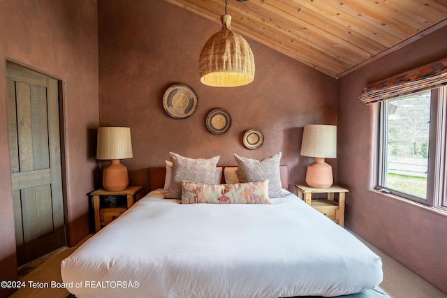 bedroom with wooden ceiling and vaulted ceiling