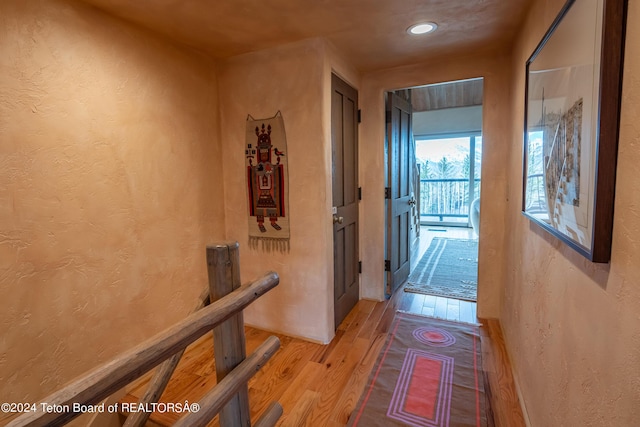 hallway featuring light hardwood / wood-style flooring