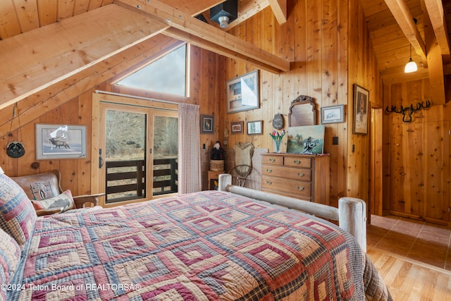 581 E Fork Rd, Dubois, WY 82513 - bedroom featuring wood walls, access to outside, wood ceiling, and wood finished floors
