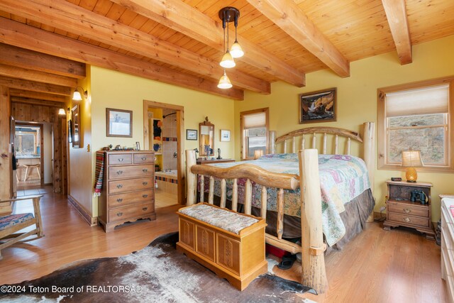 581 E Fork Rd, Dubois, WY 82513 - bedroom featuring wood finished floors and a wooden ceiling with exposed beams