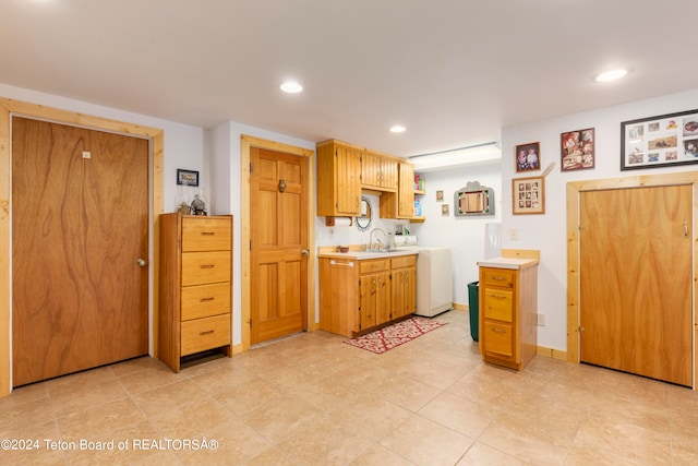 581 E Fork Rd, Dubois, WY 82513 - kitchen with light countertops, recessed lighting, separate washer and dryer, and open shelves