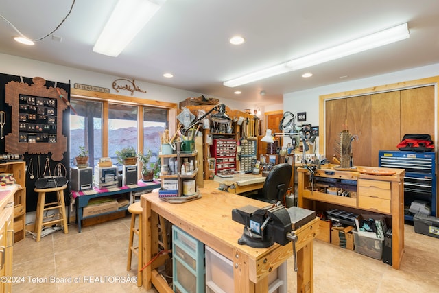 581 E Fork Rd, Dubois, WY 82513 - home office featuring a workshop area, light tile patterned floors, and recessed lighting