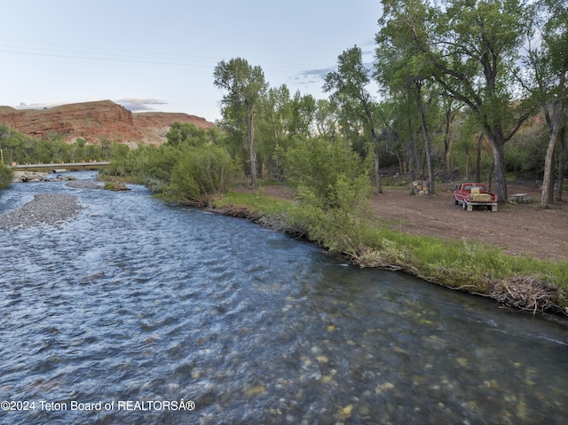 581 E Fork Rd, Dubois, WY 82513 - water view with a mountainous background