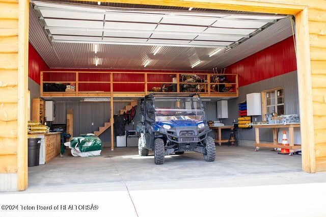 garage with a workshop area