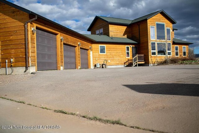 exterior space with wood walls