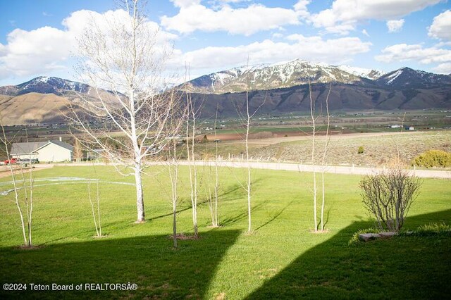 view of mountain feature featuring a rural view