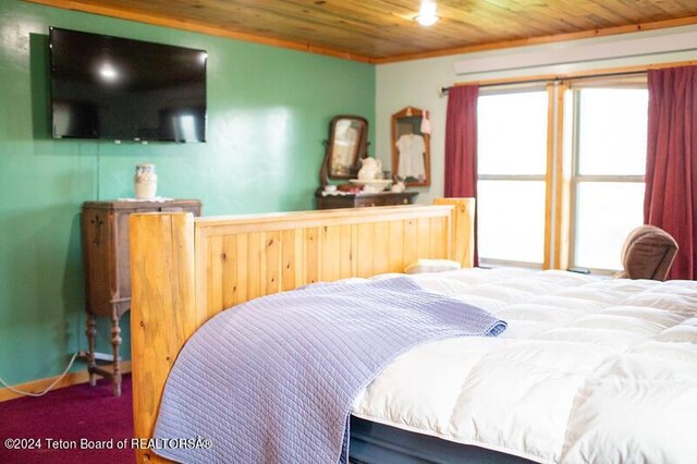 bedroom with wood ceiling