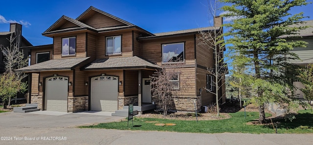 view of front of property featuring a garage