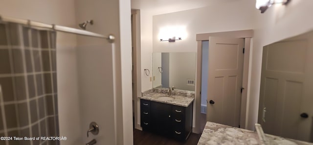 bathroom with wood-type flooring and vanity