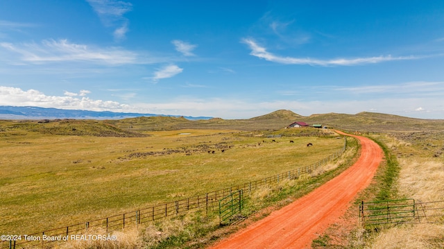 property view of mountains with a rural view