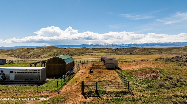 view of mountain feature featuring a rural view